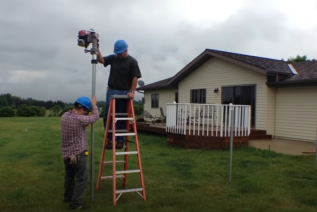 Using the Rhino GPD-40 Post Driver to finish the fence job in inclement weather