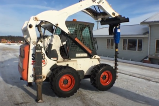 Down pressure helps Auger Torque to work in tougher soil