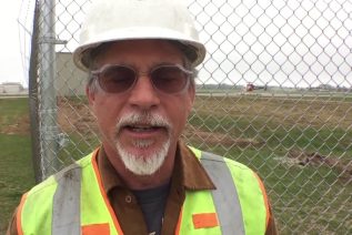 Lobo Post Puller gets at difficult fence posts in ditch Fence