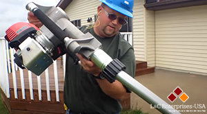 Gas-Powered Driver Pounds Fence Post for Chain Link Project