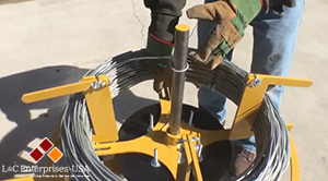 Tension Wire Dispenser For Chain Link Fence